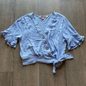 Cropped blue button detail top size S
